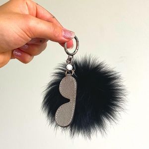 Michael Kors black purse puff / keychain with leather charm